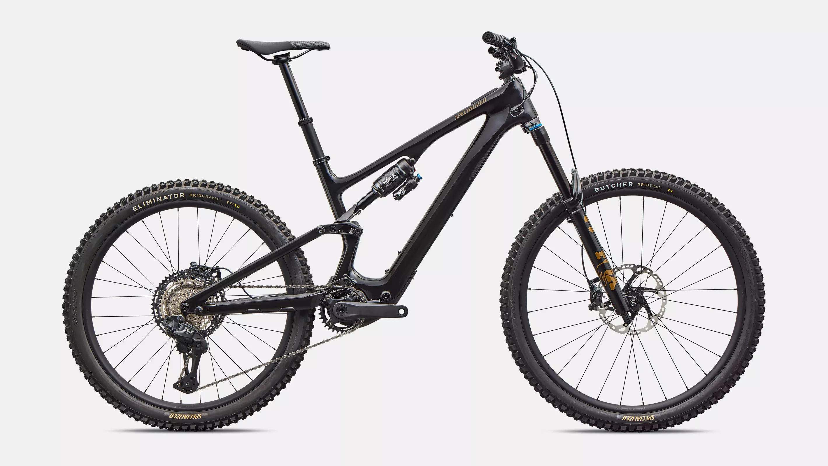 velo de la marque specialized de couleur carbon/burnt gold metallic
