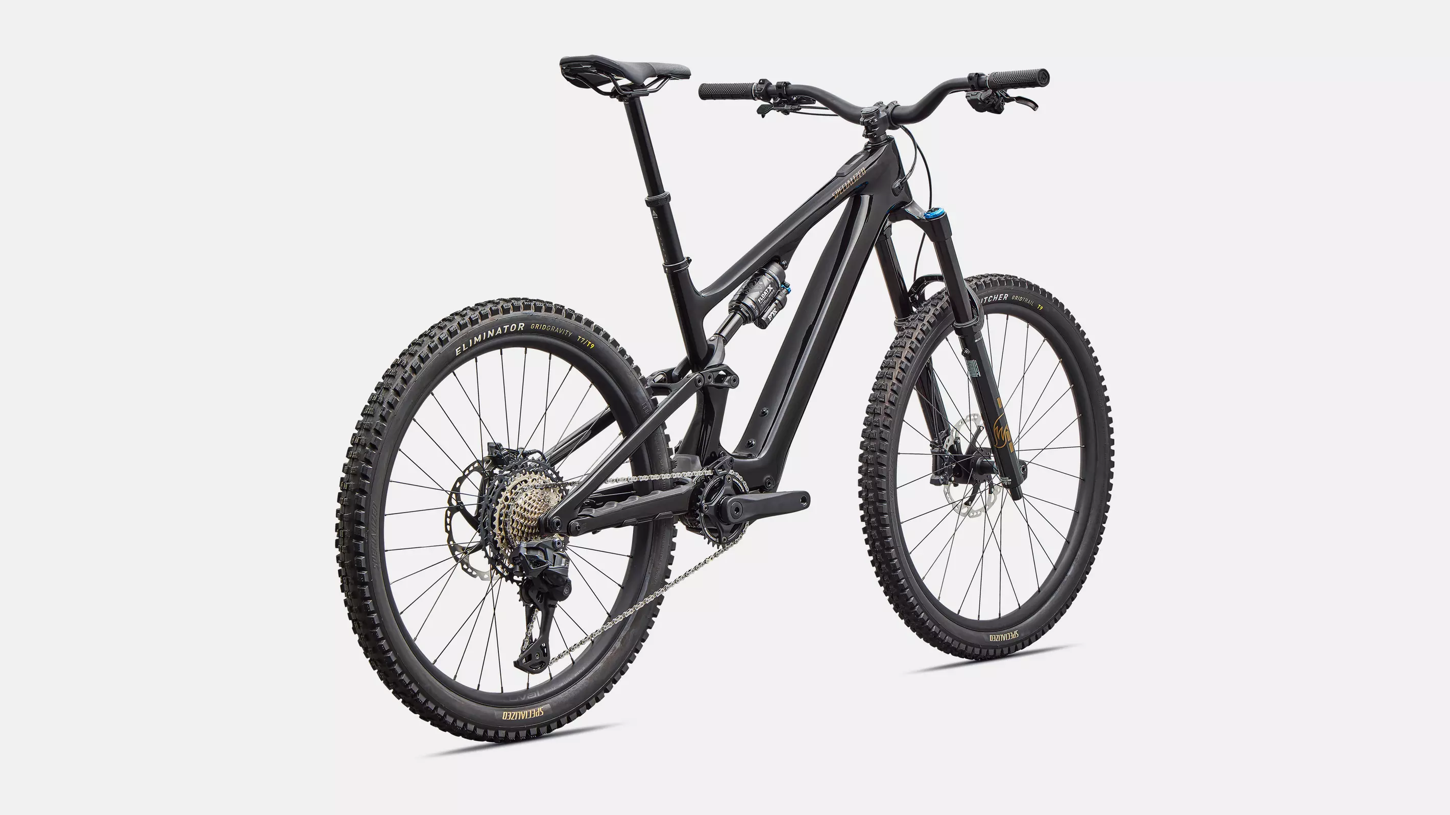 velo de la marque specialized de couleur carbon/burnt gold metallic